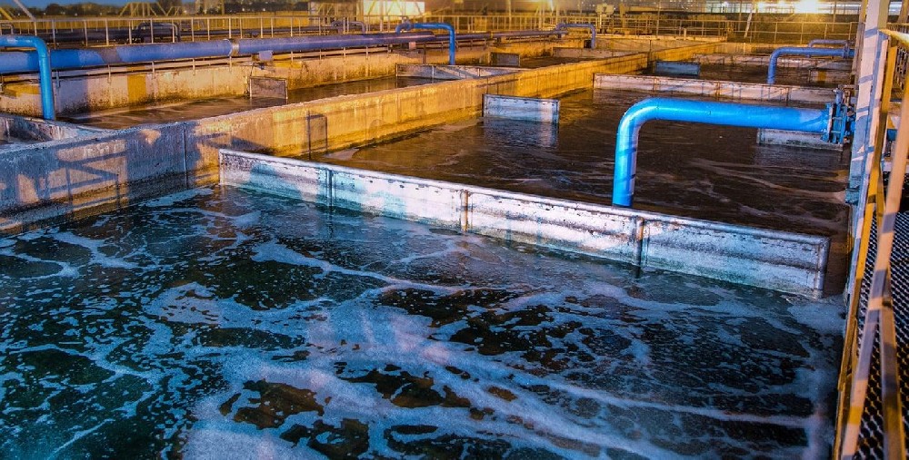 sludge process monitoring basin for wastewater treatment